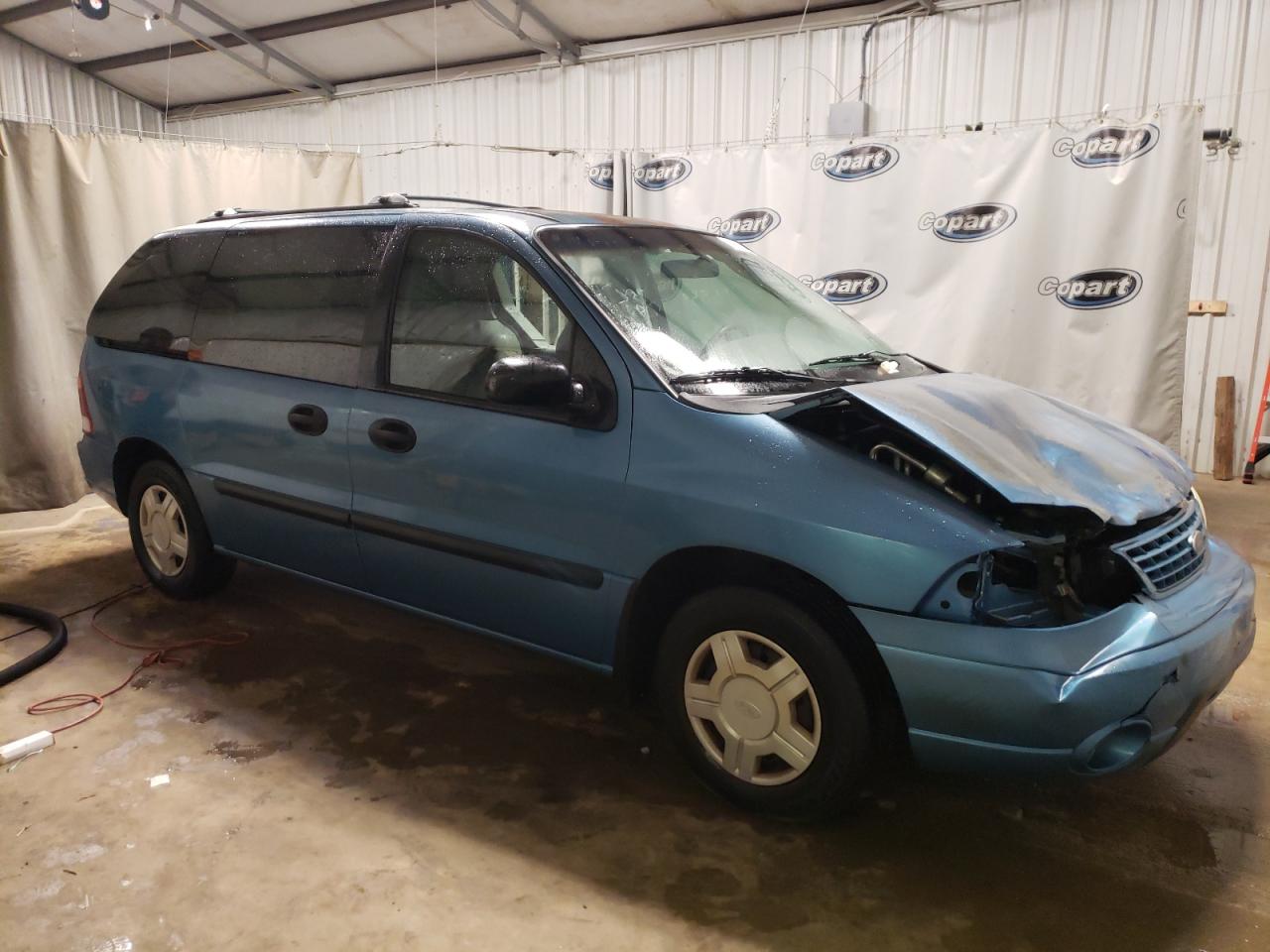 FORD WINDSTAR L 2003 with VIN 2FMZA51403BB85880 - Photo from auction
