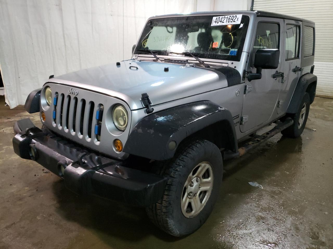 Photo 2 from auction – 2014 JEEP WRANGLER U with VIN 1C4BJWDG6EL173611