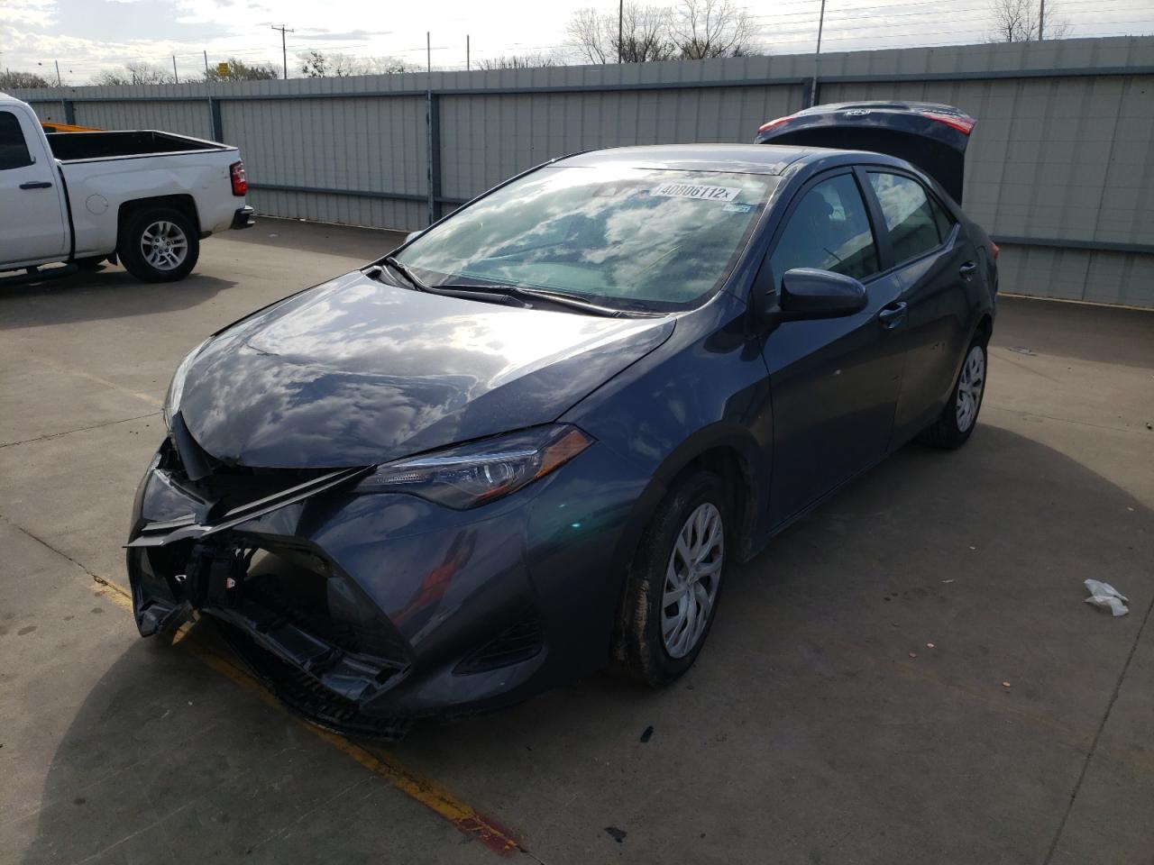 Photo 2 from auction – 2019 TOYOTA COROLLA L with VIN 5YFBURHE8KP876132
