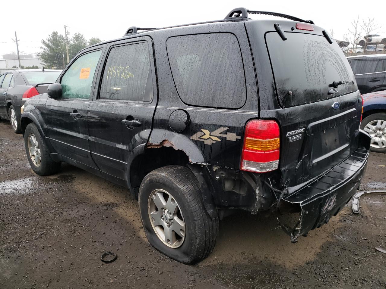 Photo 3 from auction – 2005 FORD ESCAPE LIM with VIN 1FMYU94115KA56132