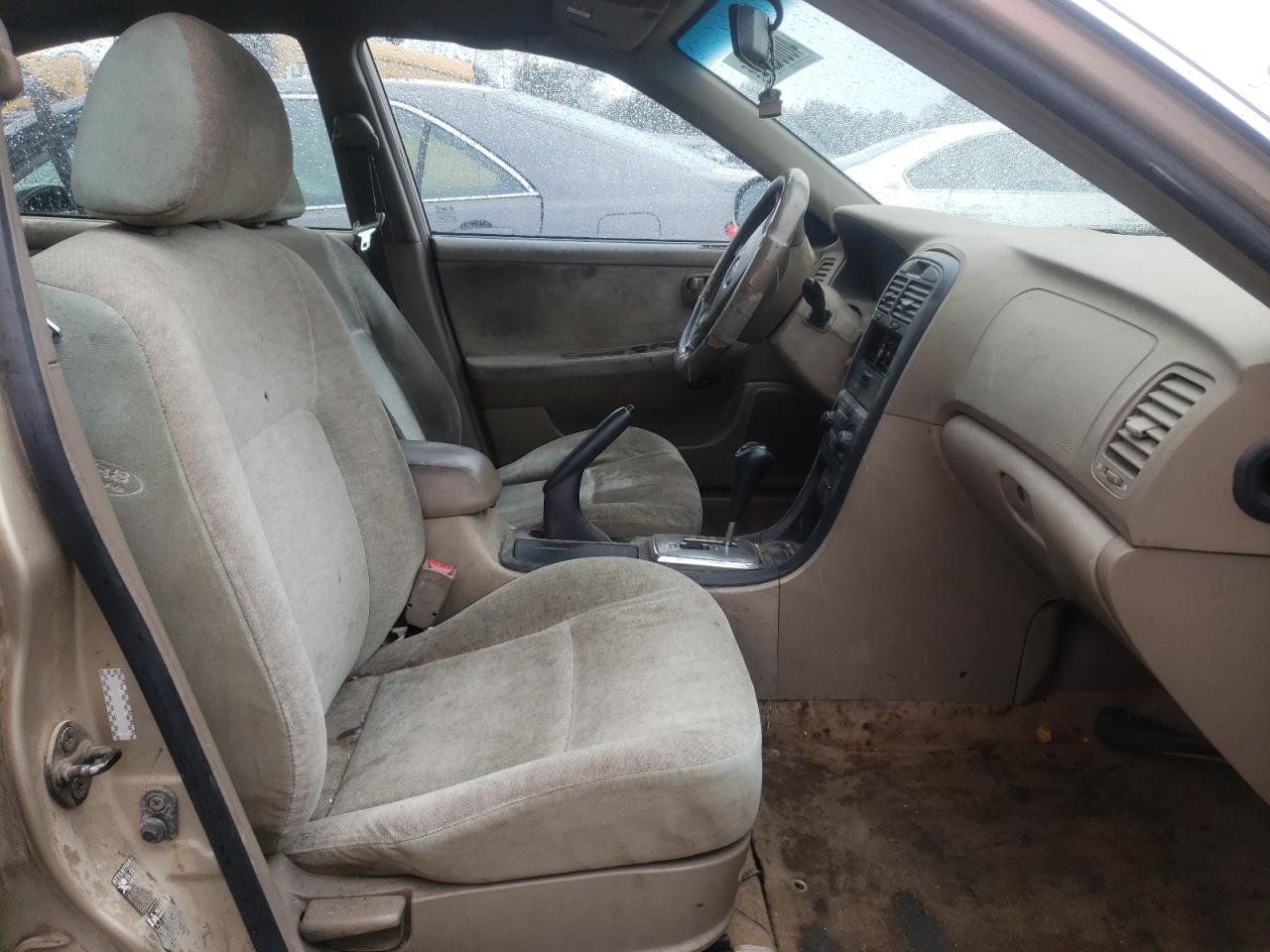 Photo 5 from auction – 2004 KIA OPTIMA LX with VIN KNAGD126445365555