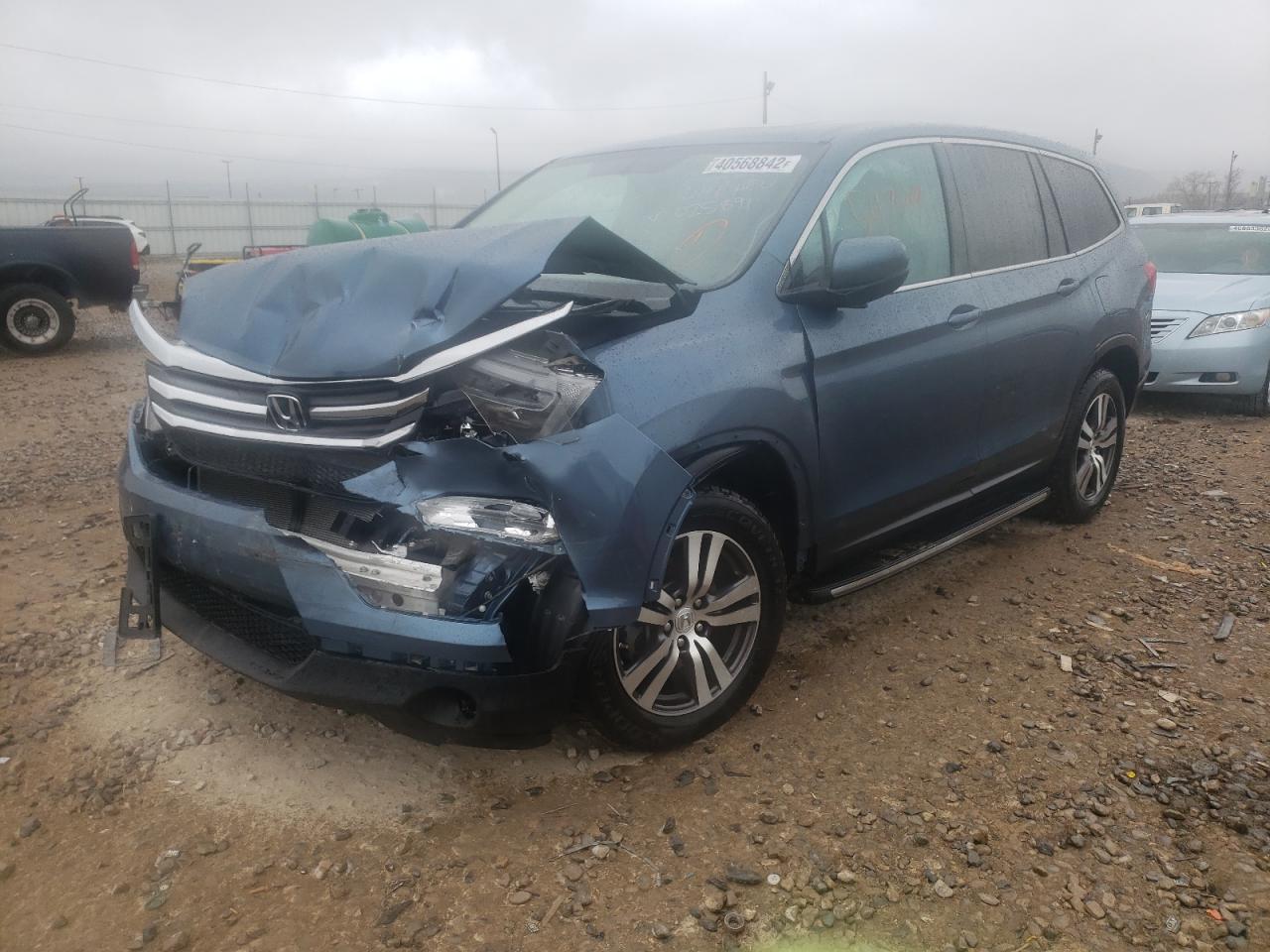 Photo 2 from auction – 2016 HONDA PILOT EXL with VIN 5FNYF5H55GB025891