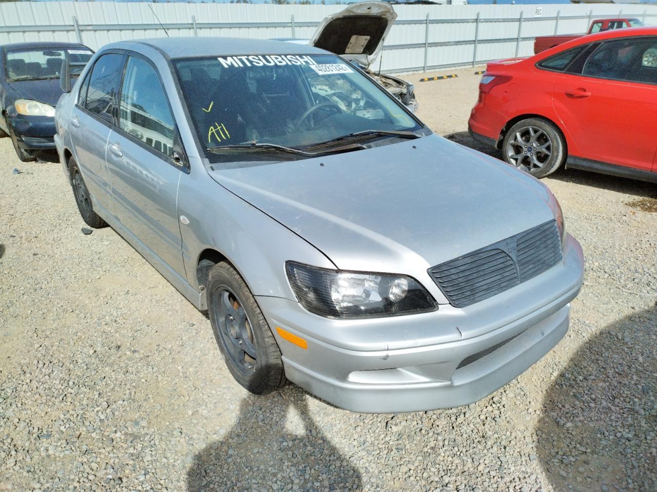 MITSUBISHI LANCER OZ 2002 with VIN JA3AJ86E72U081883 - Photo from auction