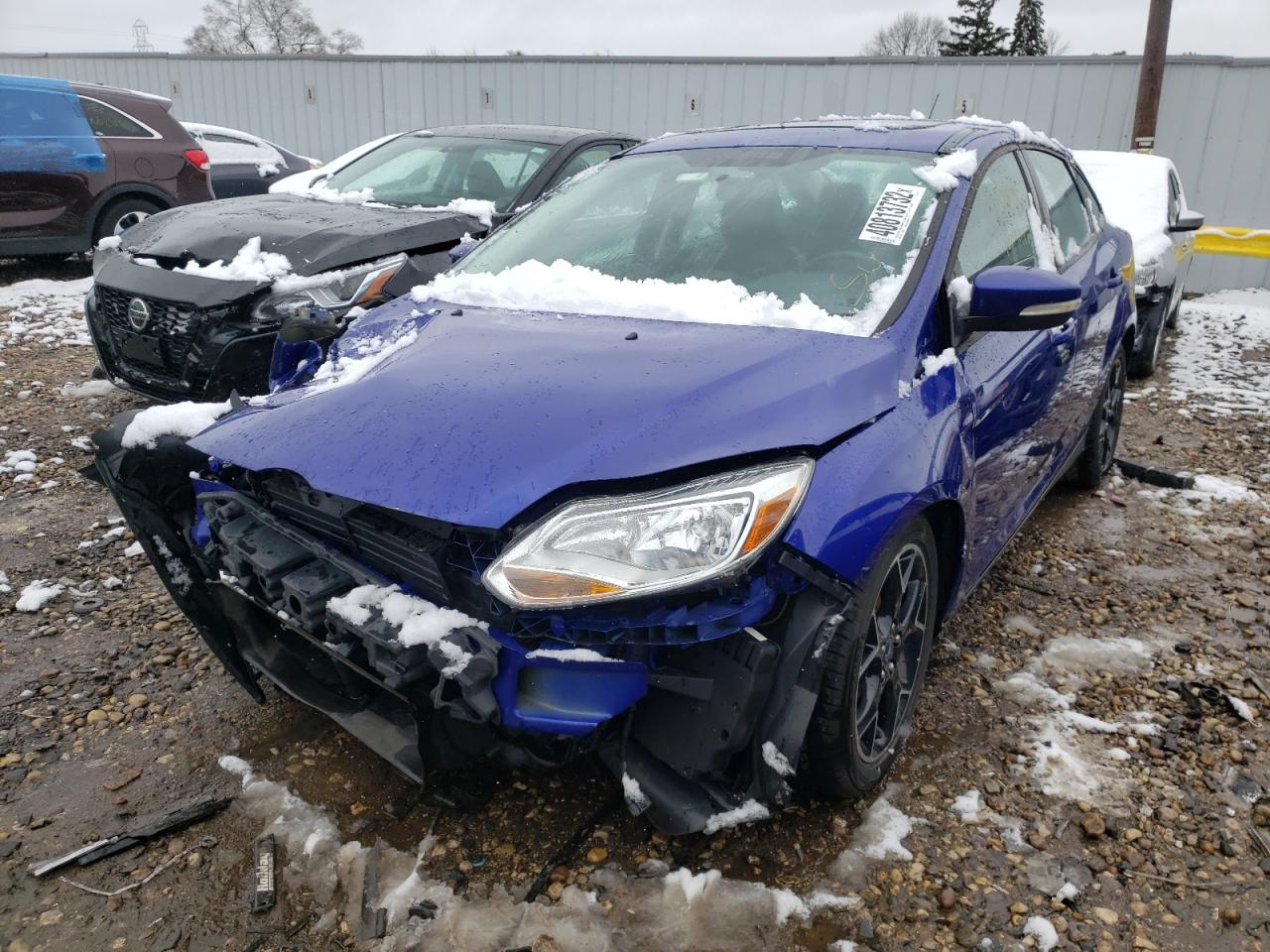 Photo 2 from auction – 2013 FORD FOCUS SE with VIN 1FADP3F27DL105104