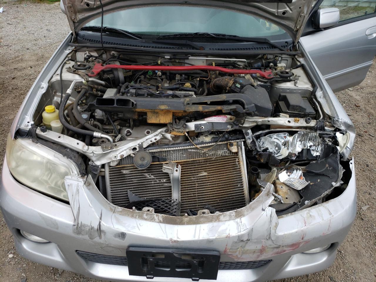 Photo 7 from auction – 2003 MAZDA PROTEGE PR with VIN JM1BJ245X31103366