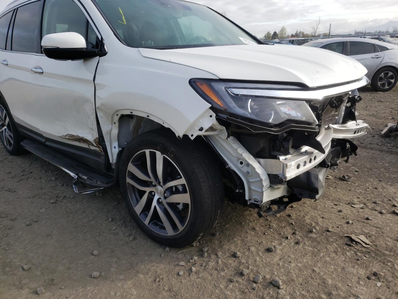 Photo 9 from auction – 2017 HONDA PILOT ELIT with VIN 5FNYF6H0XHB079120