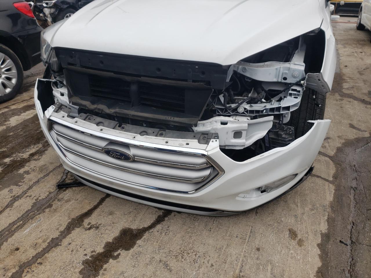 Photo 19 from auction – 2017 FORD ESCAPE SE with VIN 1FMCU0GD6HUE64520