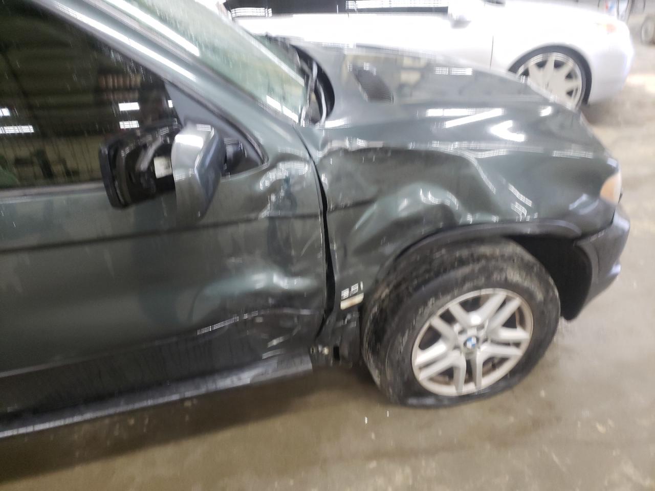 Photo 9 from auction – 2006 BMW X5 3.0I with VIN 5UXFA13556LY34579