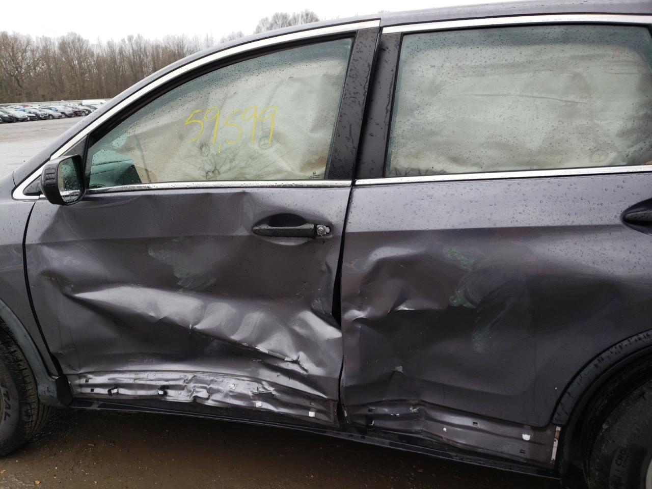 Photo 10 from auction – 2016 HONDA CR-V LX with VIN 5J6RM4H31GL121852