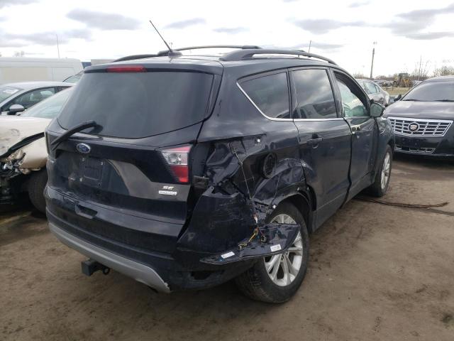 Photo 4 from auction – 2017 FORD ESCAPE SE with VIN 1FMCU0GD6HUE59530