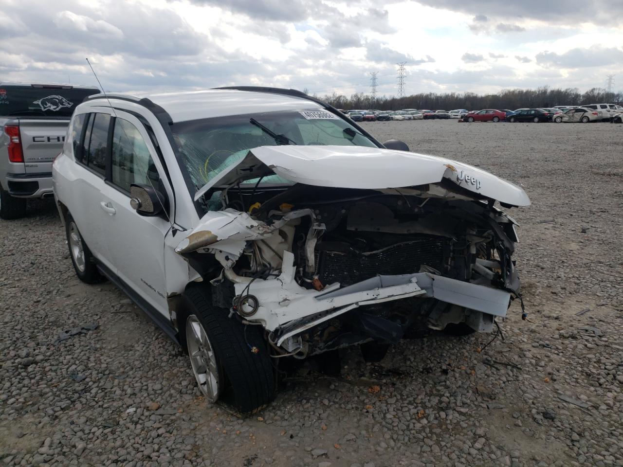 JEEP COMPASS SP 2014 with VIN 1C4NJCBA3ED728289 - Photo from auction
