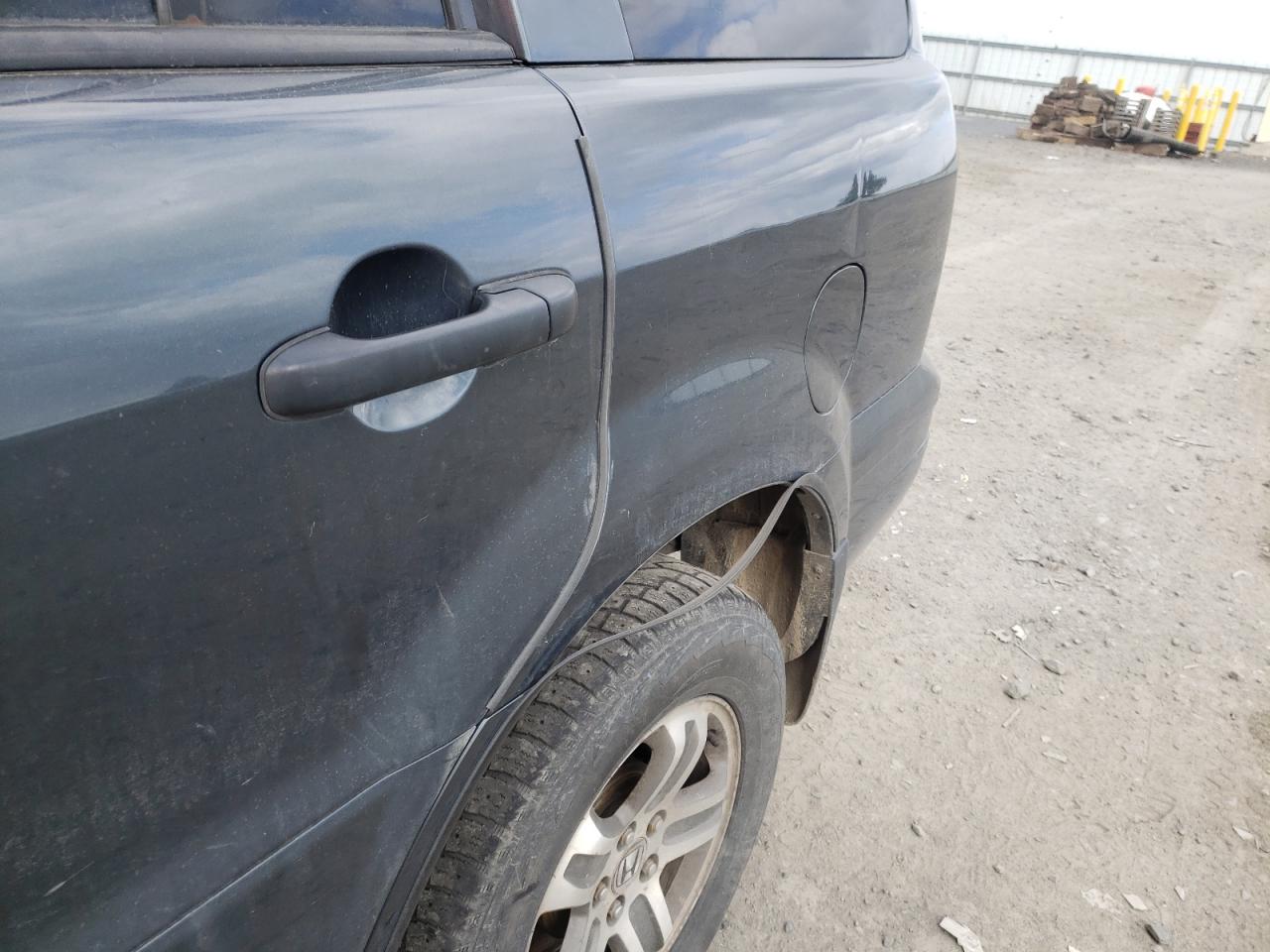Photo 10 from auction – 2004 HONDA PILOT EXL with VIN 2HKYF18534H549434