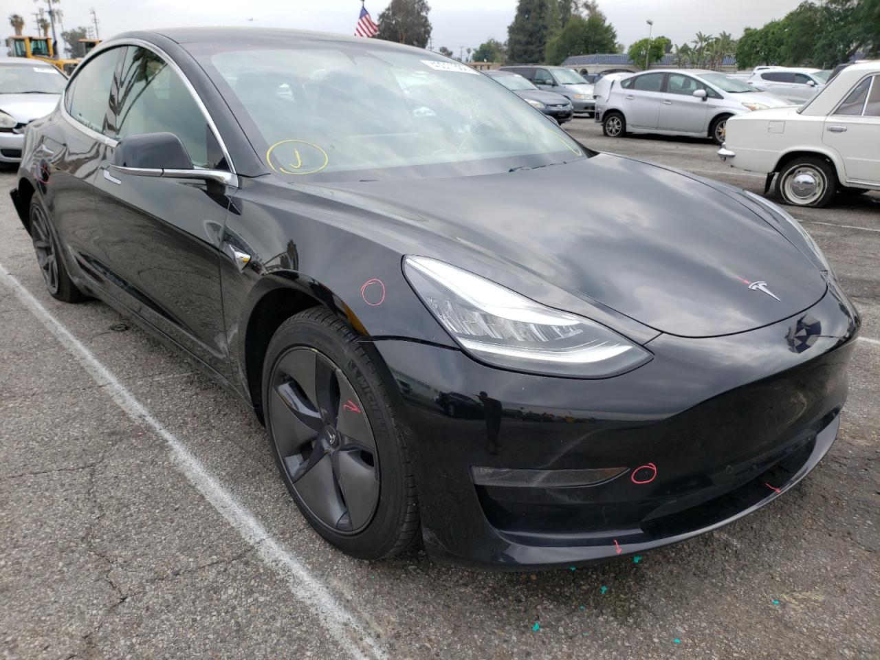 TESLA MODEL 3 2019 with VIN 5YJ3E1EB4KF384433 - Photo from auction