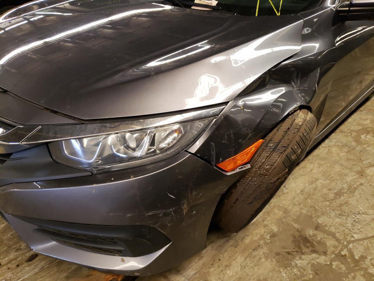 Photo 9 from auction – 2017 HONDA CIVIC LX with VIN 19XFC2F50HE005833