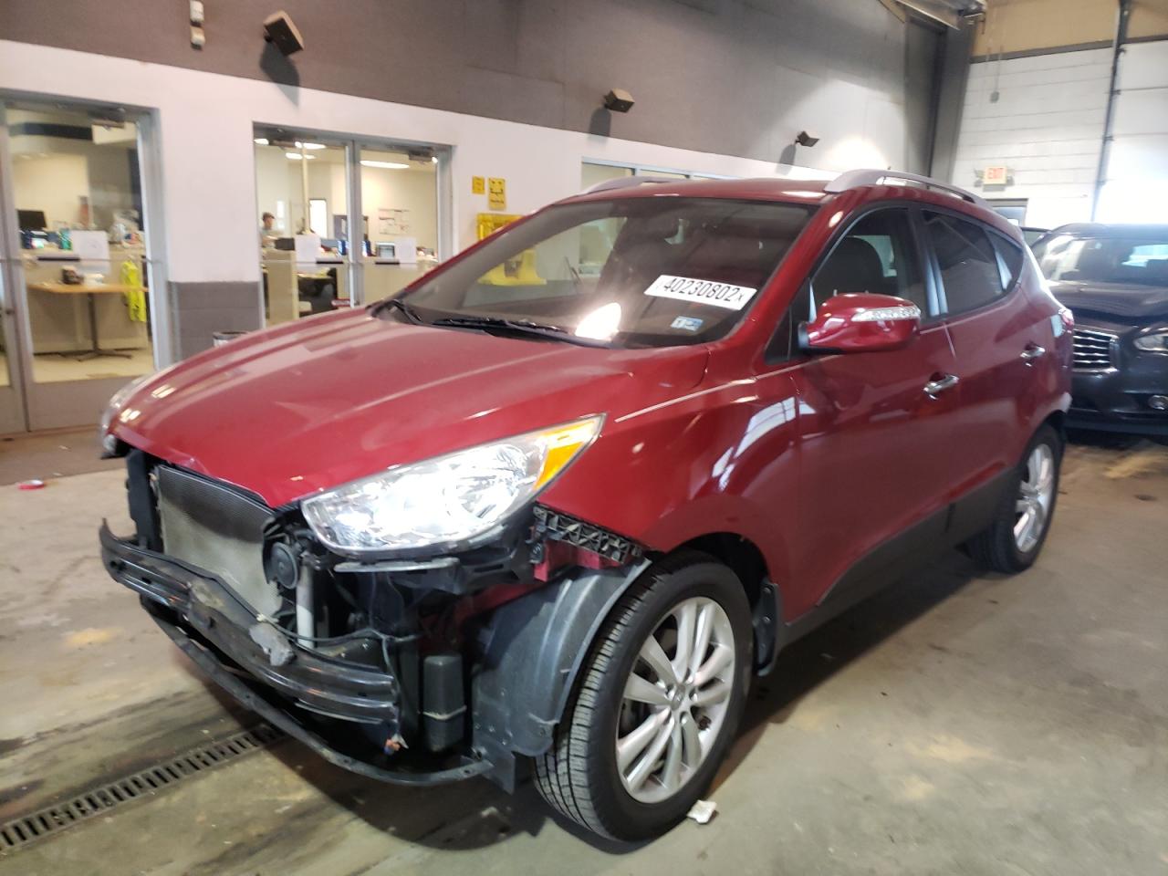 Photo 2 from auction – 2011 HYUNDAI TUCSON with VIN KM8JUCAC5BU310977