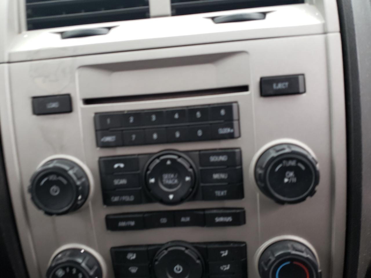 Photo 9 from auction – 2009 FORD ESCAPE XLT with VIN 1FMCU03719KA29921
