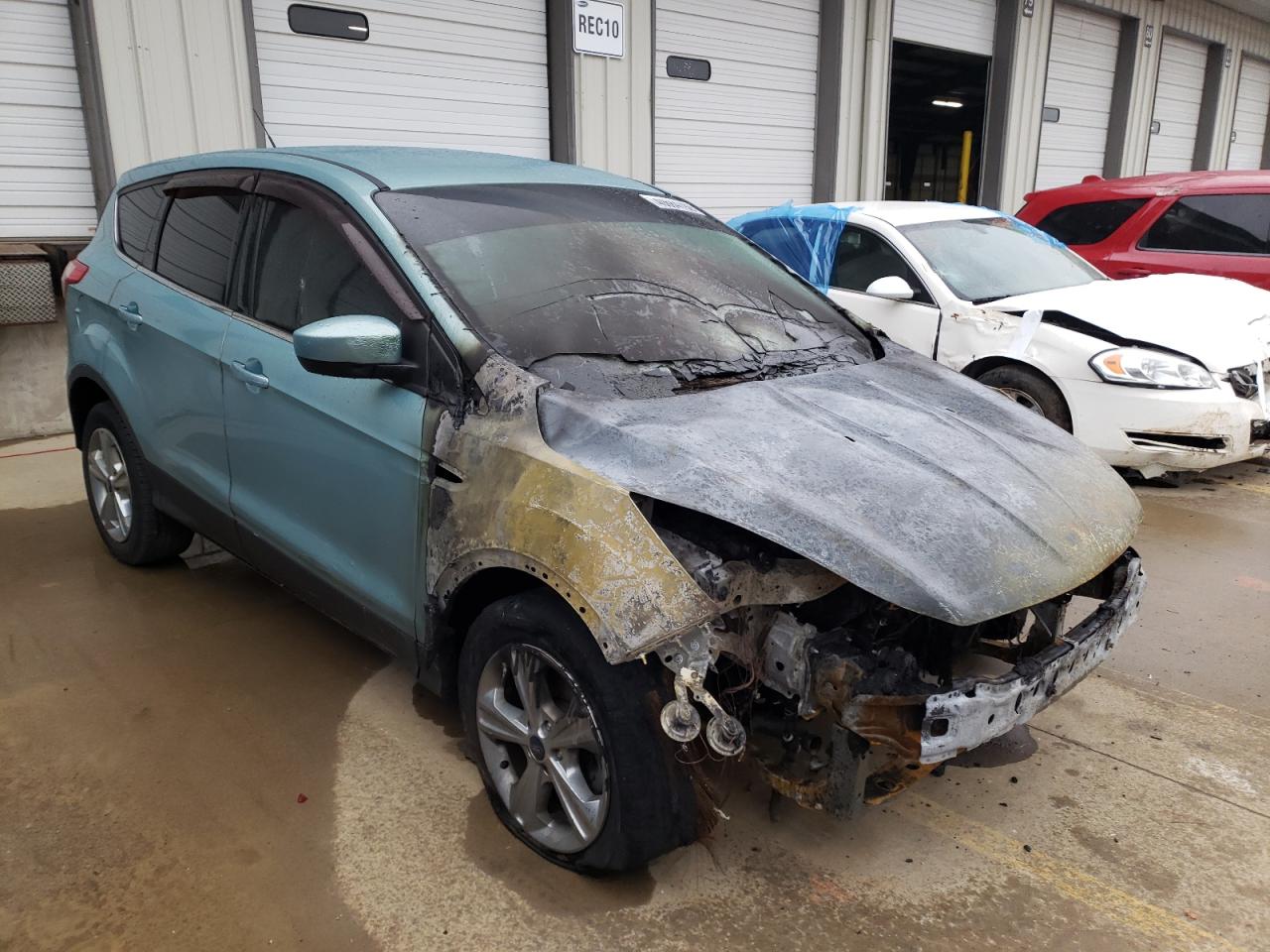 FORD ESCAPE SE 2013 with VIN 1FMCU0GX0DUC69100 - Photo from auction