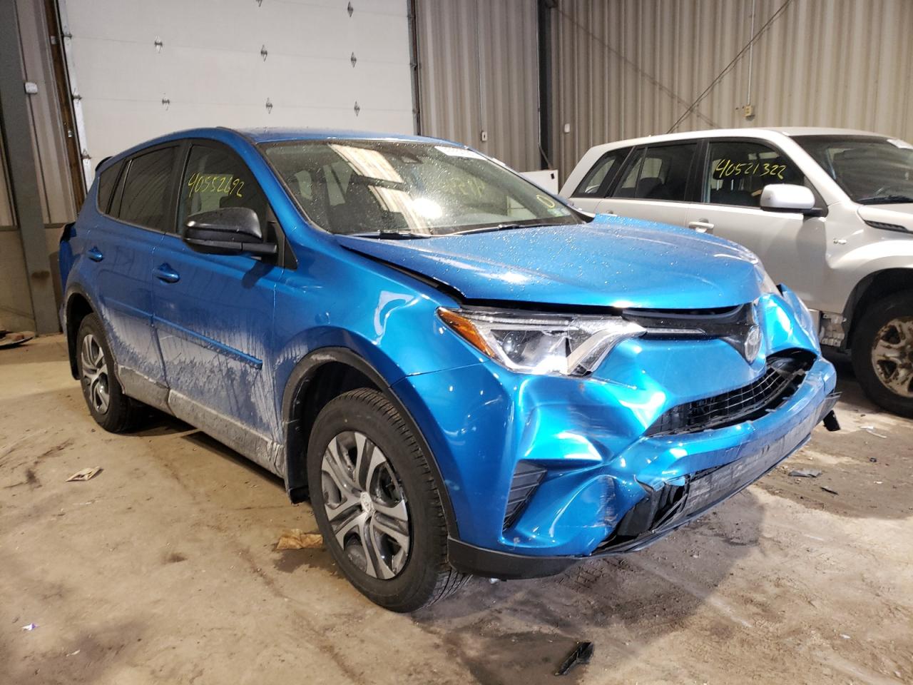TOYOTA RAV4 LE 2018 with VIN JTMBFREVXJJ181569 - Photo from auction
