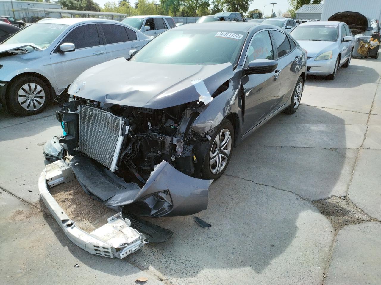 Photo 2 from auction – 2016 HONDA CIVIC LX with VIN 19XFC2F59GE239600