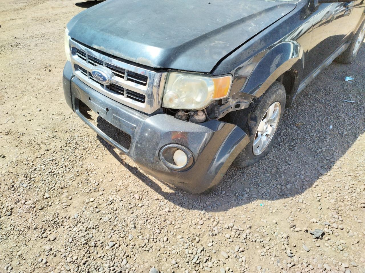 Photo 9 from auction – 2011 FORD ESCAPE LIM with VIN 1FMCU9EGXBKA33912