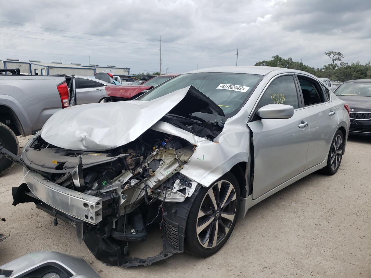 Photo 2 from auction – 2016 NISSAN ALTIMA 2.5 with VIN 1N4AL3AP2GN390868