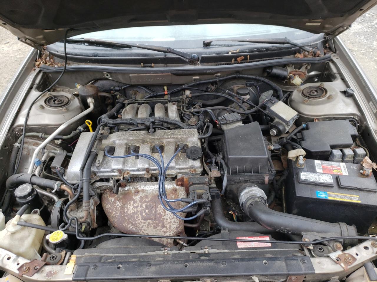 Photo 7 from auction – 1998 MAZDA 626 DX with VIN 1YVGF22C5W5770961