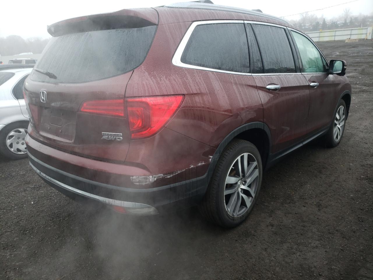 Photo 4 from auction – 2018 HONDA PILOT TOUR with VIN 5FNYF6H94JB021444