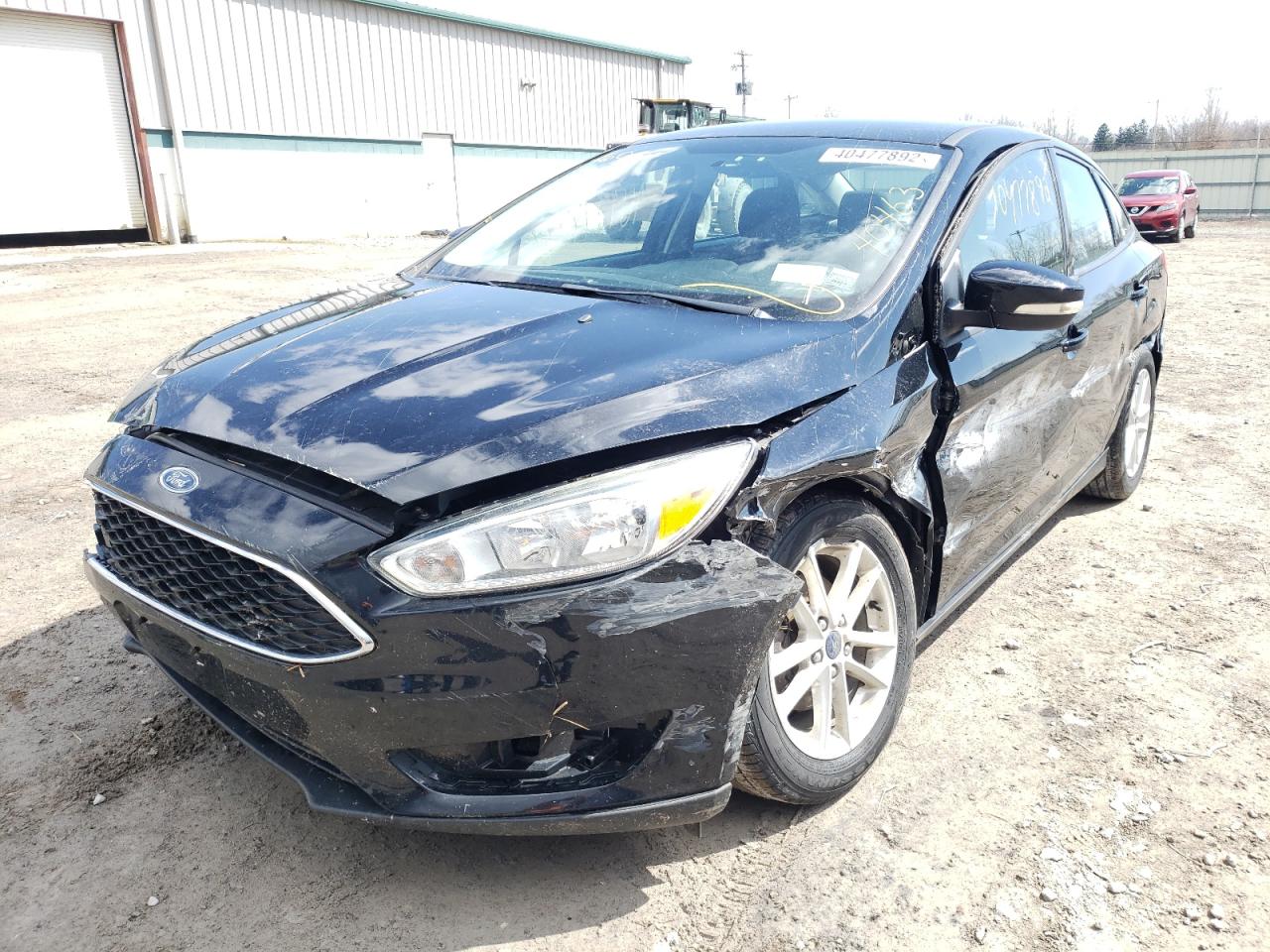 Photo 2 from auction – 2016 FORD FOCUS SE with VIN 1FADP3F23GL299781