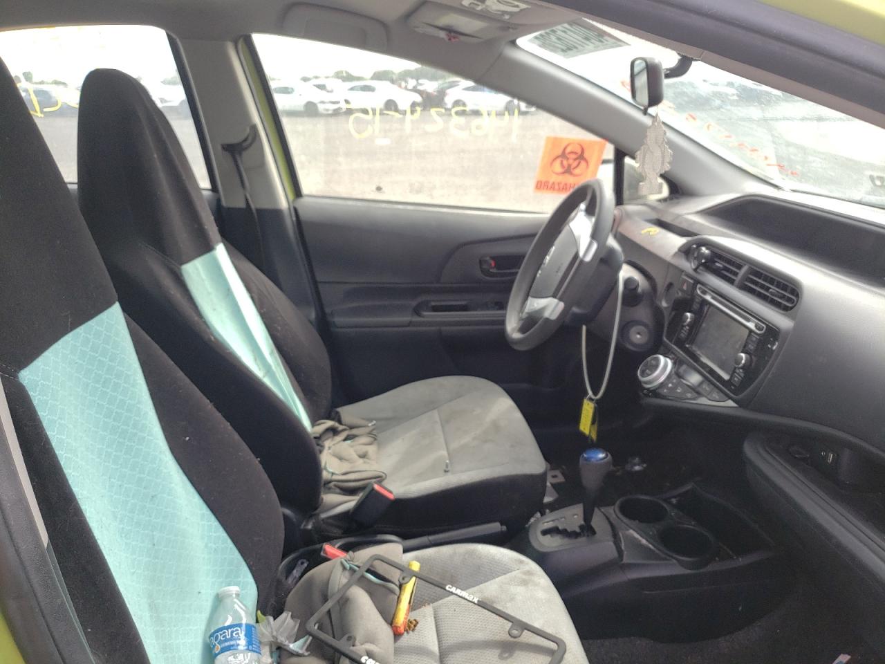 Photo 5 from auction – 2015 TOYOTA PRIUS C with VIN JTDKDTB39F1103538