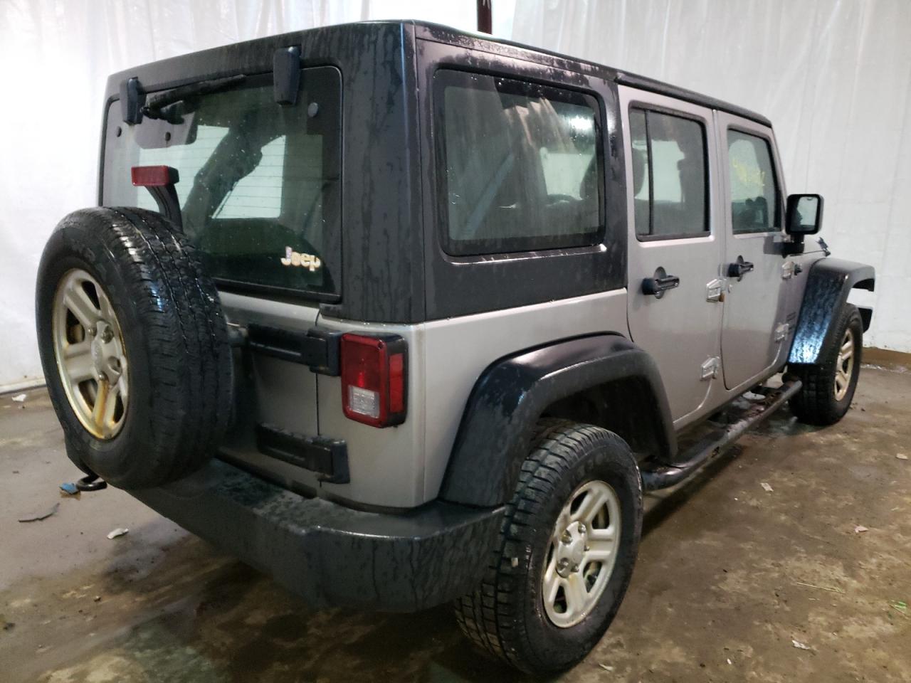 Photo 4 from auction – 2014 JEEP WRANGLER U with VIN 1C4BJWDG6EL173611