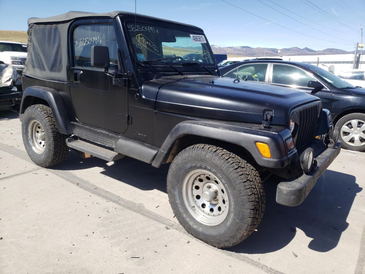 JEEP WRANGLER / 1999 with VIN 1J4FY19S3XP478731 - Photo from auction