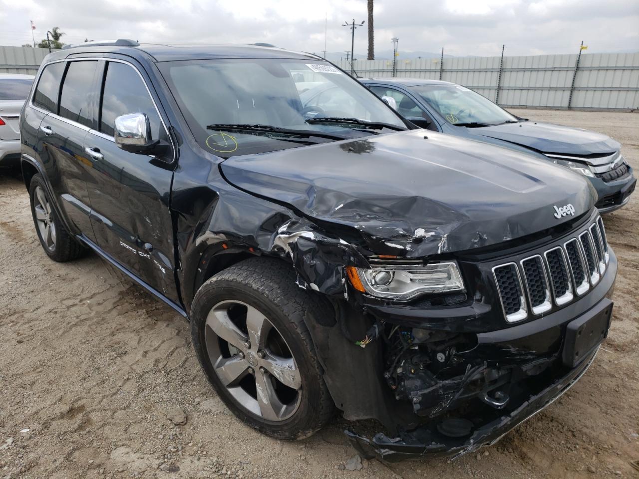 JEEP GRAND CHER 2014 with VIN 1C4RJFCM2EC580573 - Photo from auction