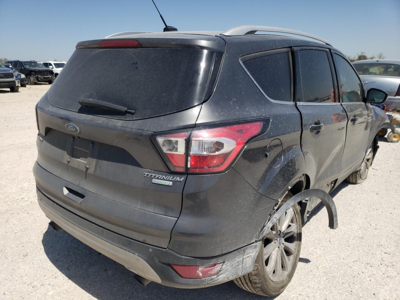Photo 4 from auction – 2017 FORD ESCAPE TIT with VIN 1FMCU0J97HUC13882