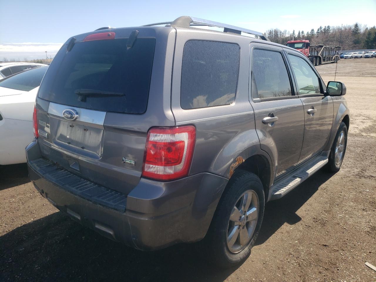 Photo 4 from auction – 2010 FORD ESCAPE LIM with VIN 1FMCU9EG9AKB87932