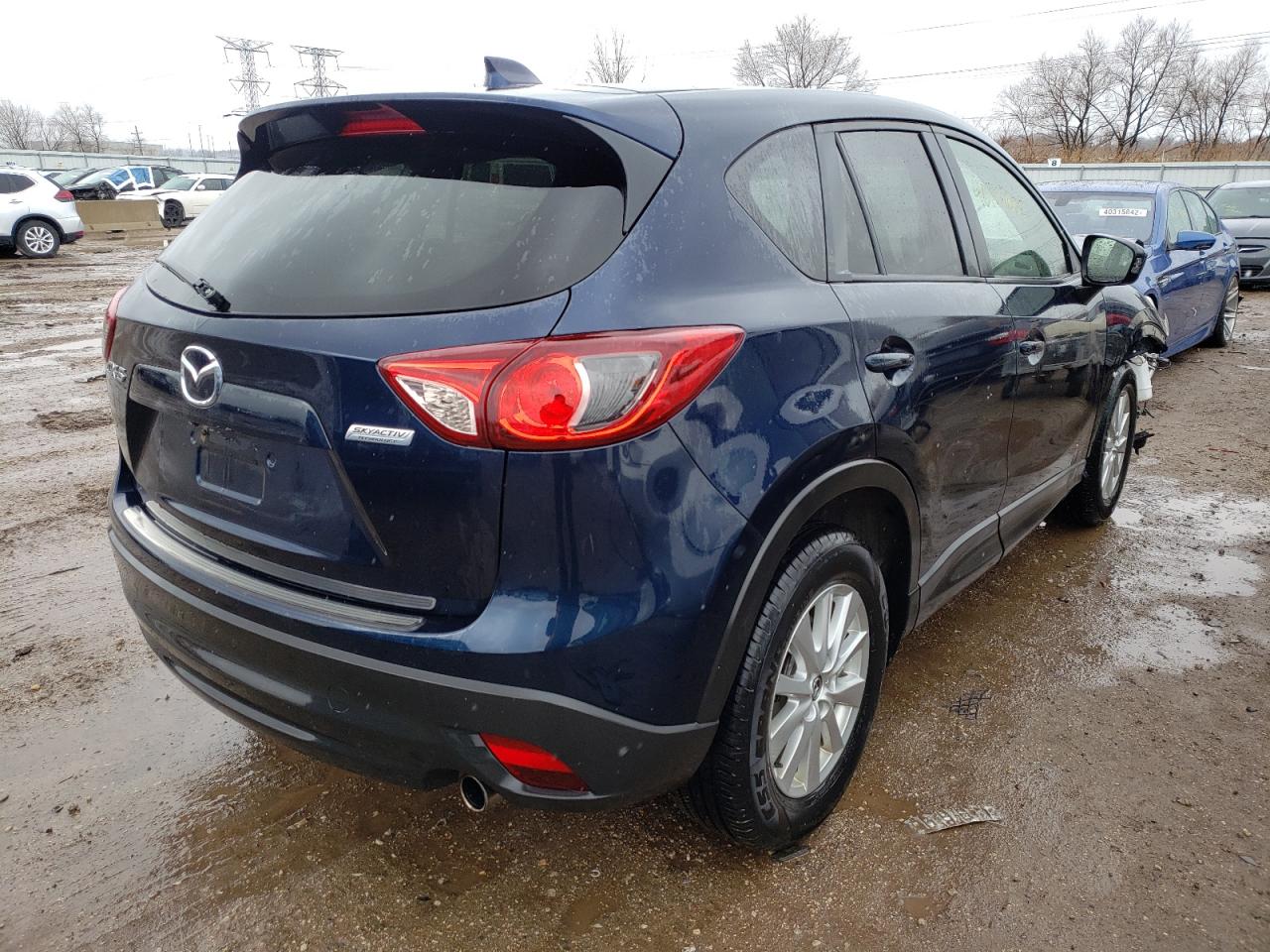 Photo 4 from auction – 2014 MAZDA CX-5 TOURI with VIN JM3KE2CY5E0421539
