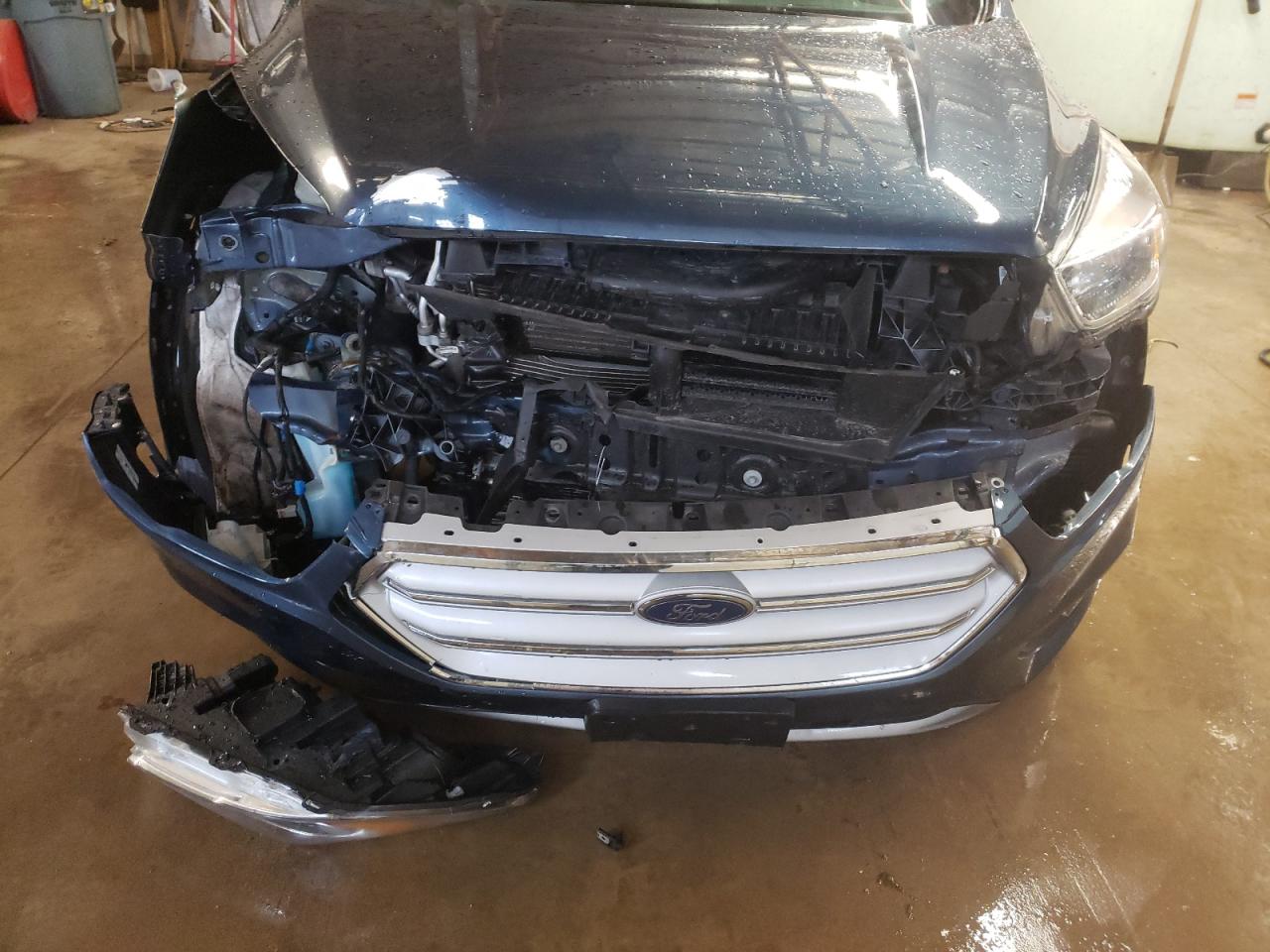 Photo 9 from auction – 2018 FORD ESCAPE SE with VIN 1FMCU0GD0JUA80481