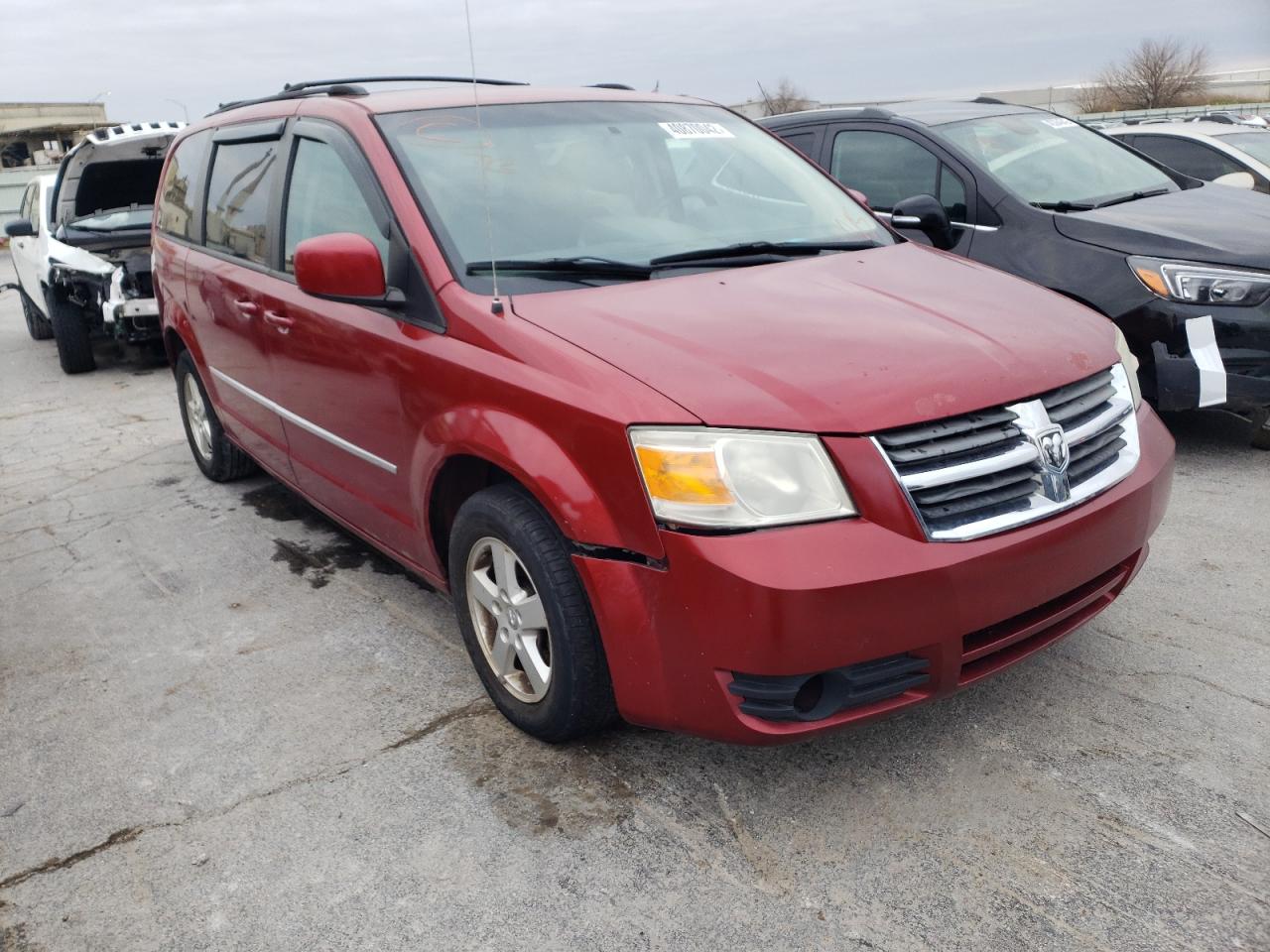 DODGE GRAND CARA 2010 with VIN 2D4RN5D10AR125986 - Photo from auction