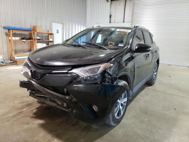 Photo 2 from auction – 2017 TOYOTA RAV4 XLE with VIN 2T3RFREV2HW647649