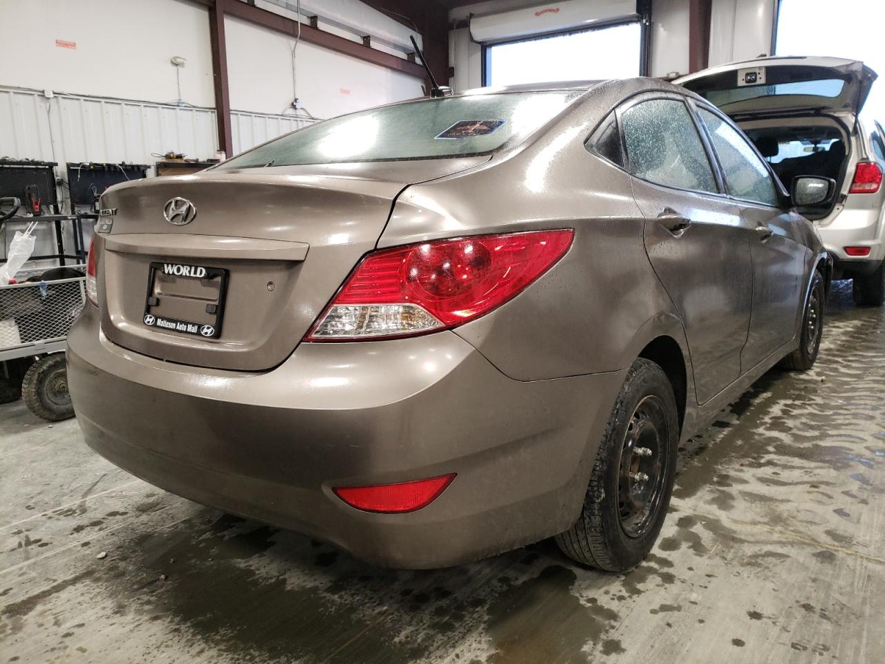 Photo 4 from auction – 2014 HYUNDAI ACCENT GLS with VIN KMHCT4AEXEU634305