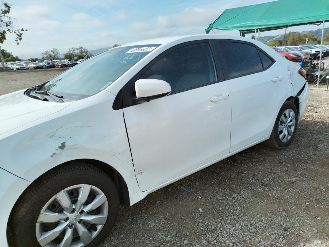 Photo 9 from auction – 2014 TOYOTA COROLLA L with VIN 5YFBURHE8EP147472