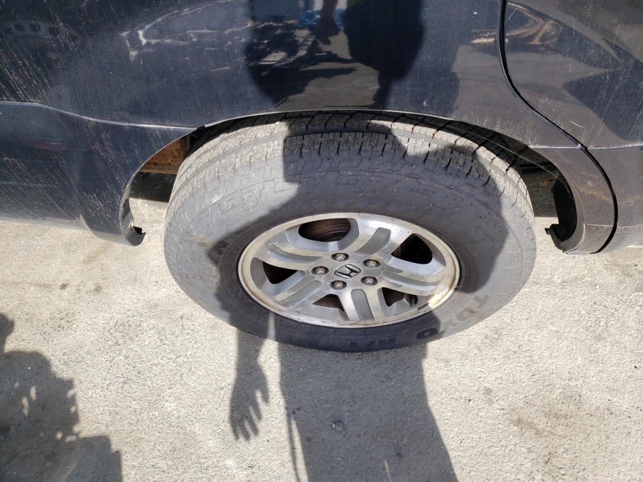 Photo 9 from auction – 2004 HONDA PILOT EXL with VIN 2HKYF18684H507740