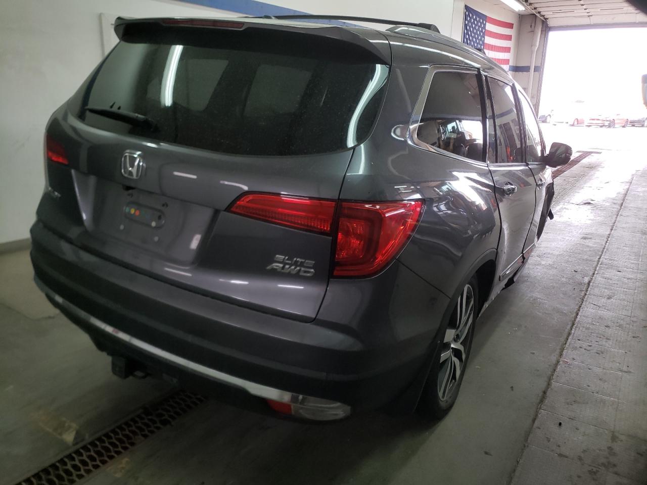 Photo 4 from auction – 2016 HONDA PILOT ELIT with VIN 5FNYF6H06GB044010