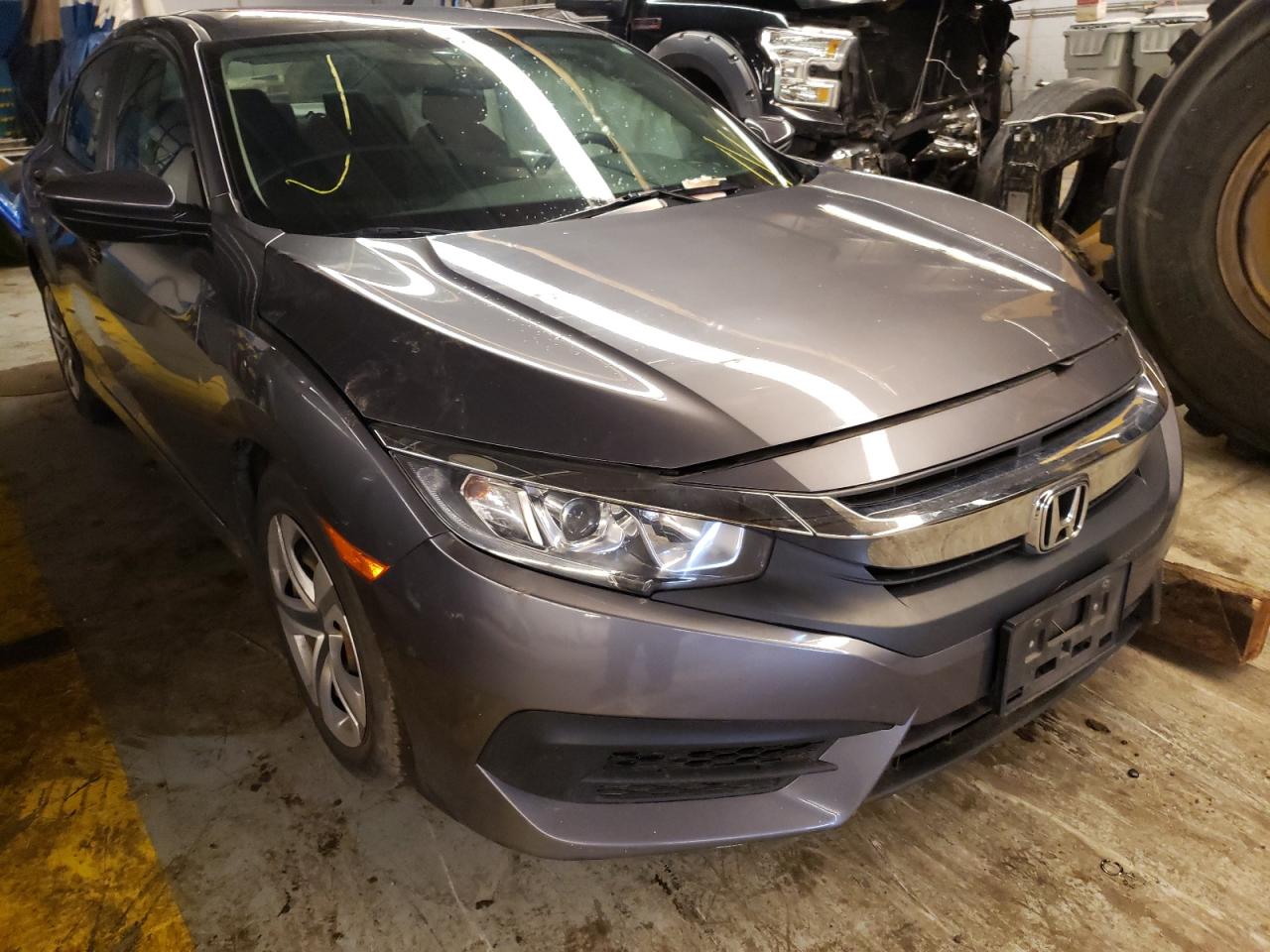 HONDA CIVIC LX 2017 with VIN 19XFC2F50HE005833 - Photo from auction