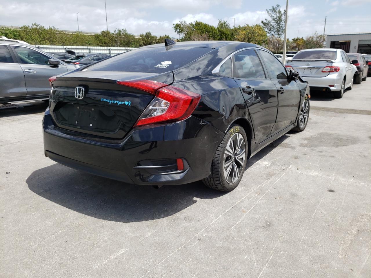 Photo 4 from auction – 2017 HONDA CIVIC EXL with VIN 19XFC1F75HE009310
