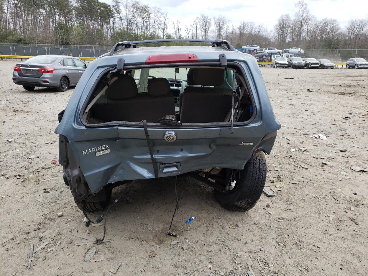 Photo 9 from auction – 2010 MERCURY MARINER PR with VIN 4M2CN9HG4AKJ15477