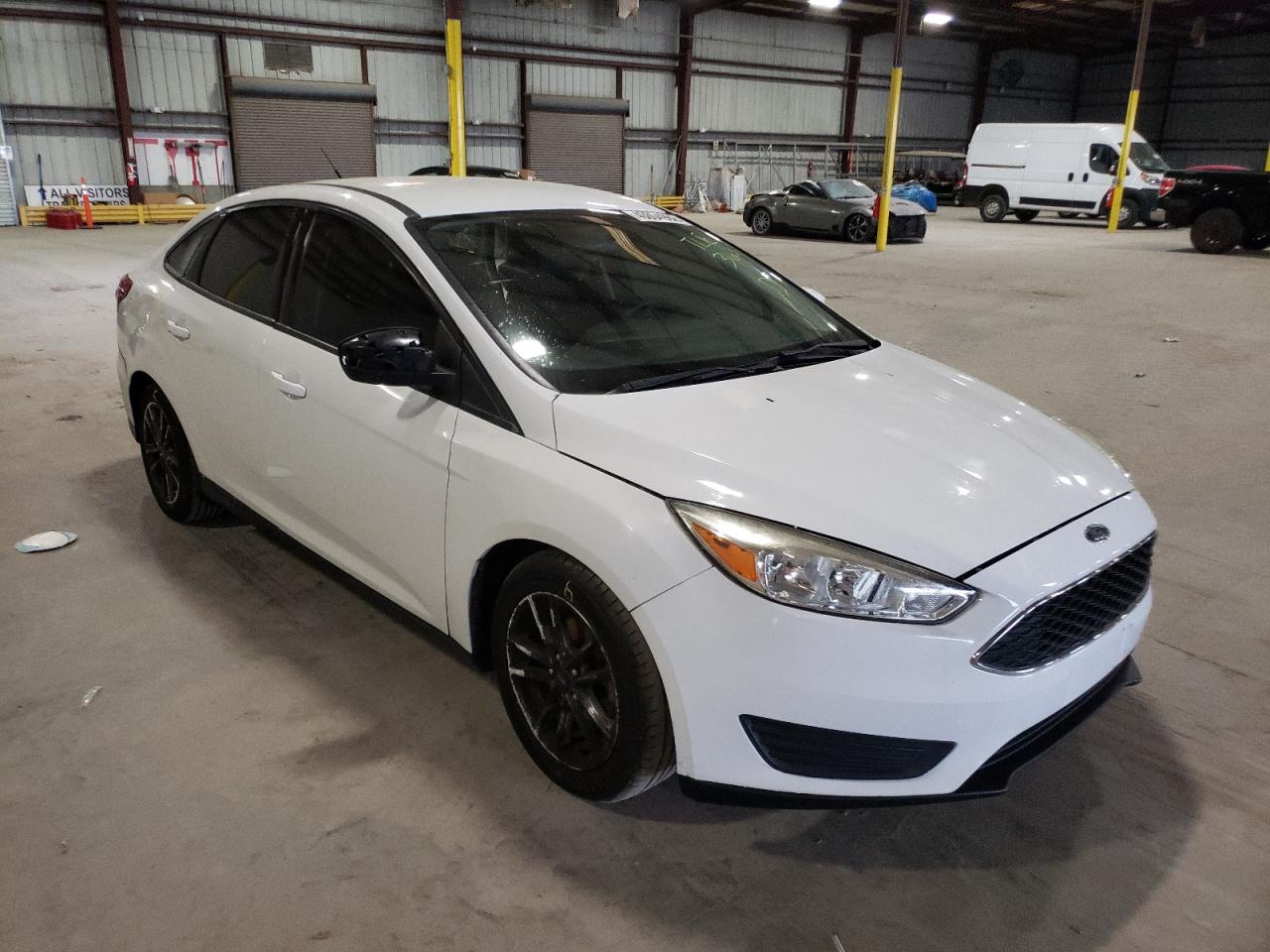 FORD FOCUS SE 2016 with VIN 1FADP3F2XGL337670 - Photo from auction