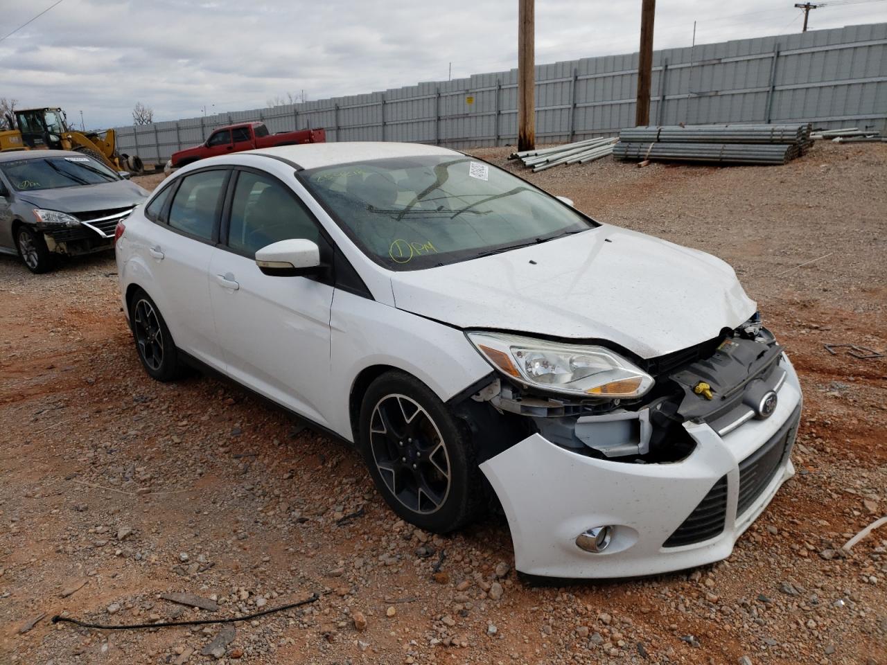FORD FOCUS SE 2014 with VIN 1FADP3F20EL259218 - Photo from auction