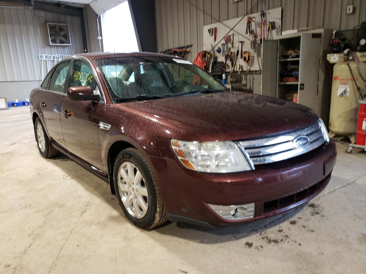 FORD TAURUS SE 2009 with VIN 1FAHP23W19G123150 - Photo from auction