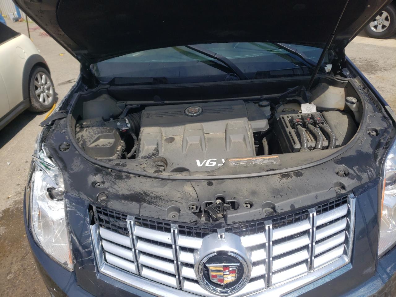 Photo 7 from auction – 2014 CADILLAC SRX LUXURY with VIN 3GYFNEE30ES581523