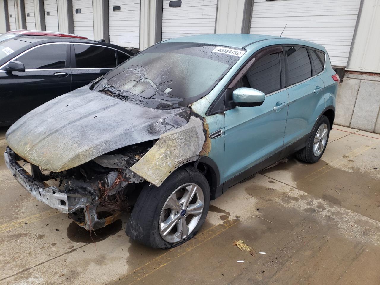 Photo 2 from auction – 2013 FORD ESCAPE SE with VIN 1FMCU0GX0DUC69100
